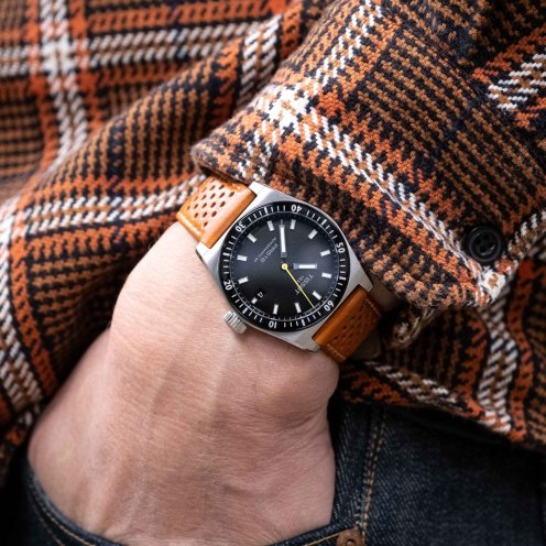 Tissot PR516 Powermatic 80 on brown leather strap, pocket shot