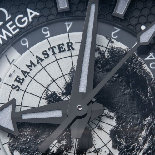 Omega Seamaster Planet Ocean Worldtimer Deep Black with gray accents, dial close up