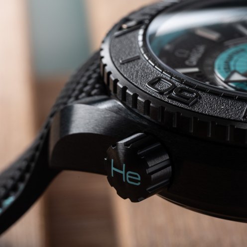 Omega Seamaster Planet Ocean Worldtimer Deep Black with turquoise accents, lug and helium release valve